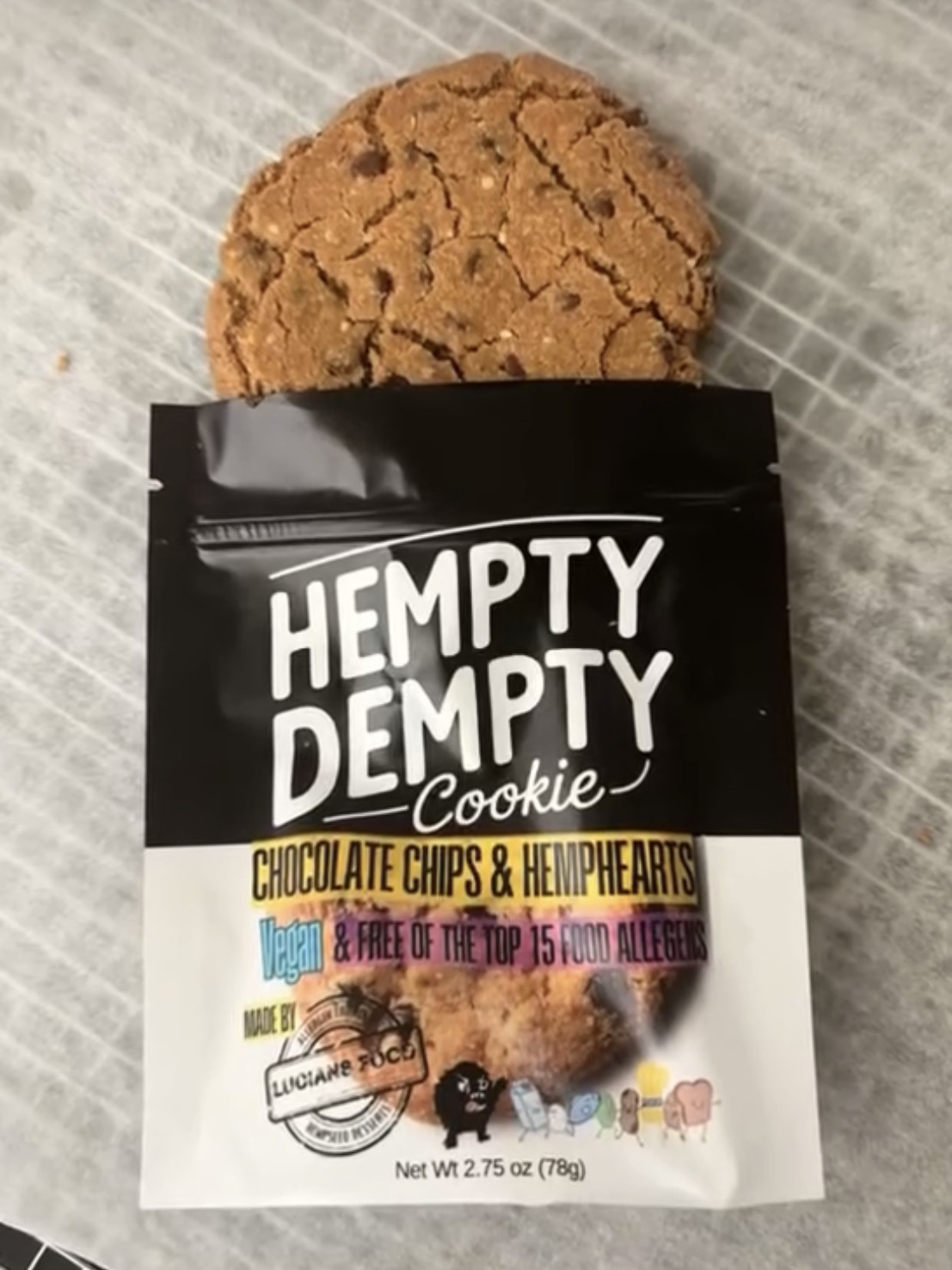 Hempty Dempty cookie next to its bag