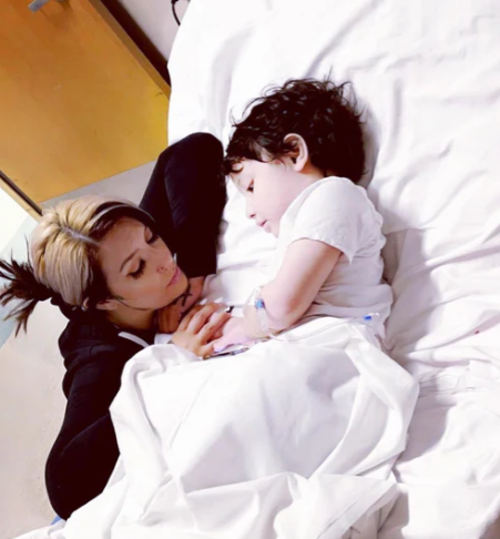 Lucian in a hospital bed after severe allergen exposure